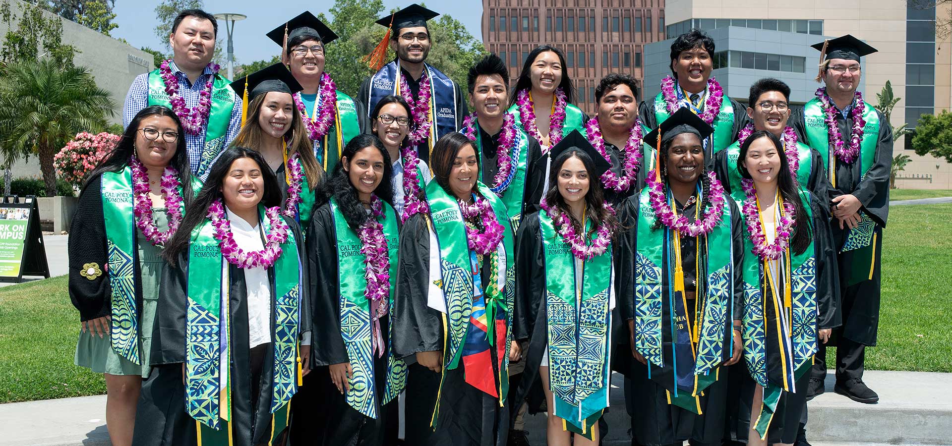 APIDA Graduates pose for a group photo.