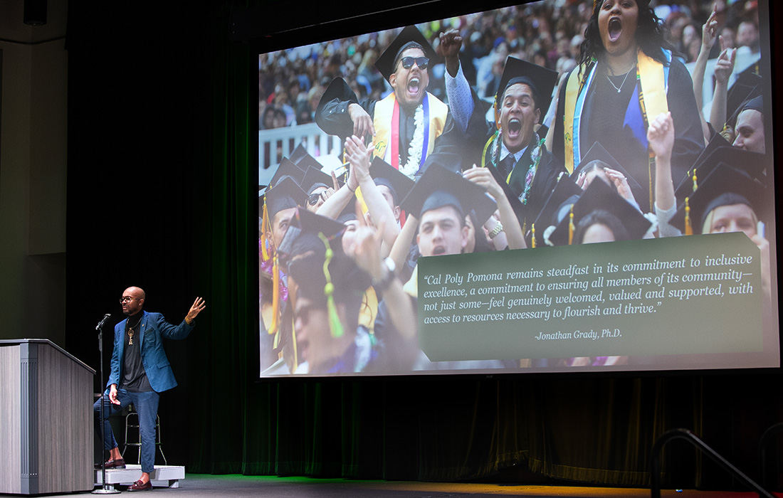 Jonathan Grady speaks on stage during the 2025 Black Thriving Initiative event. 