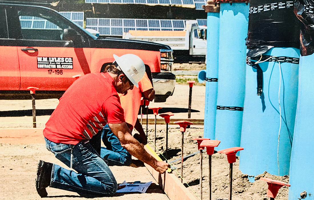 Jeffrey McDonnell  at a work site working on drilling into the ground.