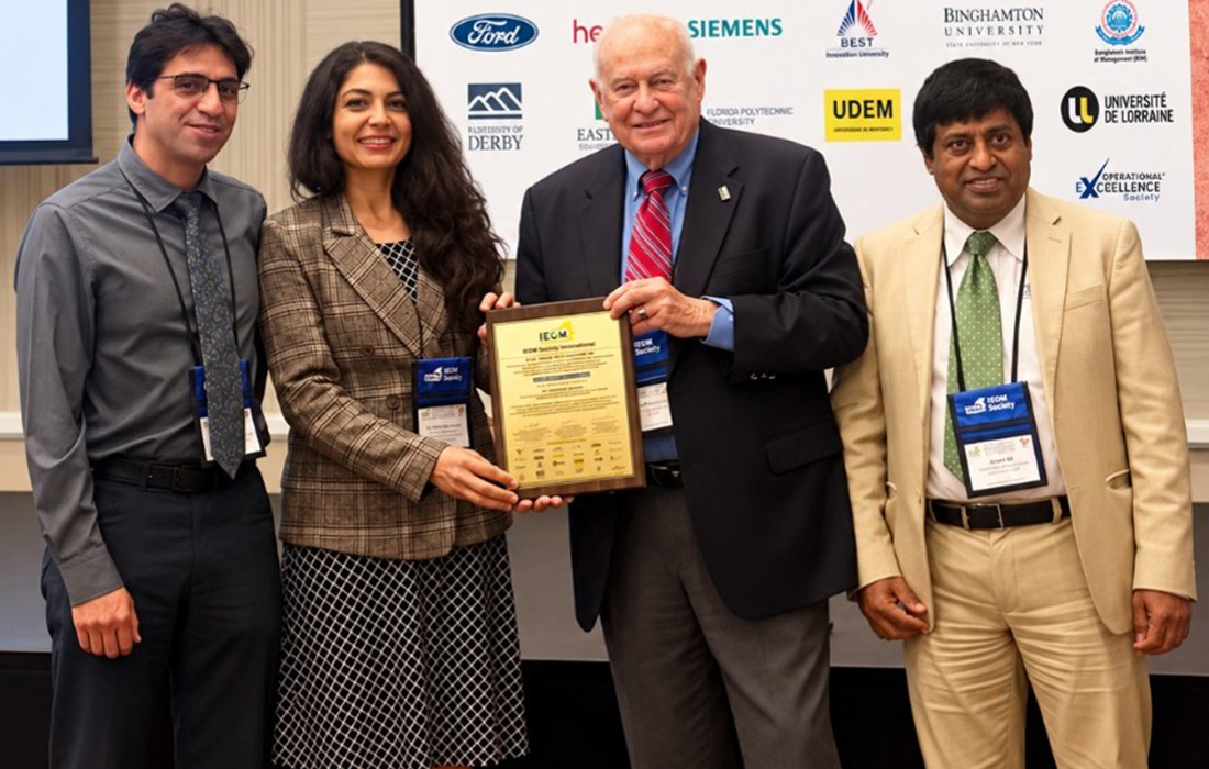 Shokoufeh Mirzaei (second from left) receives the 2026 Industrial Engineering and Operations Management (IEOM) Distinguished Educator Award