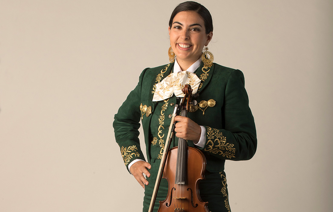 Jessie Vallejo in traditional mariachi attire.