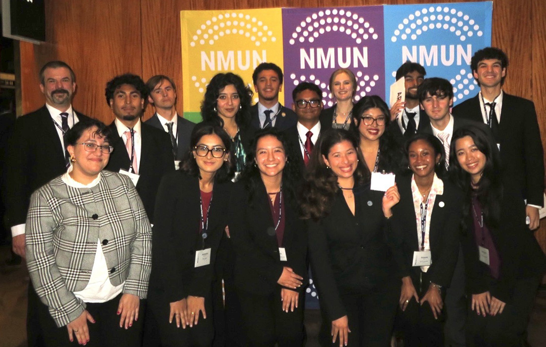 The Model UN team pose for a group photo. 