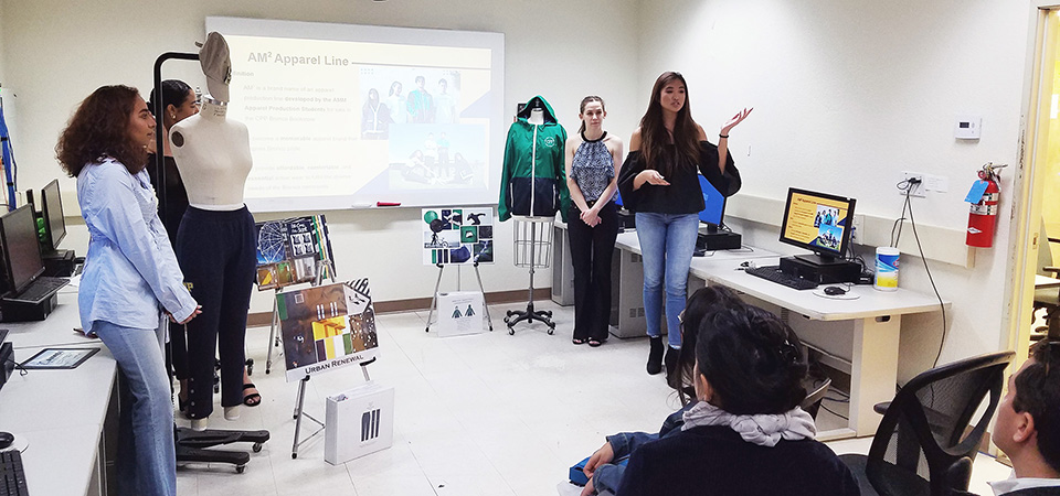 AMM students give a presentation on an apparel line they are developing