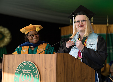 Carly Owens (‘16, communication) presents the senior class gift at the College of Letters, Arts & Social Sciences Commencement in June.