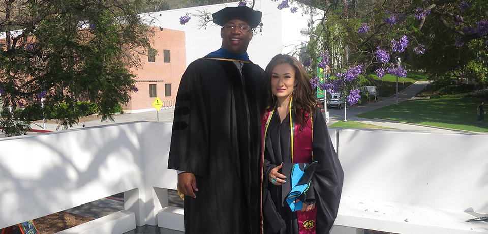 a graduate with a professor