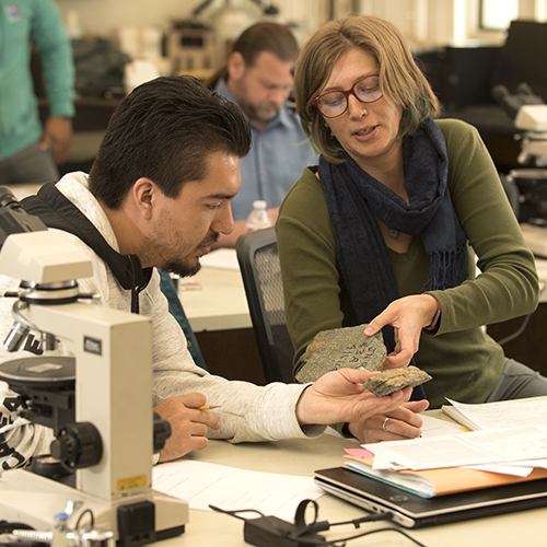 Professor and student with tablet