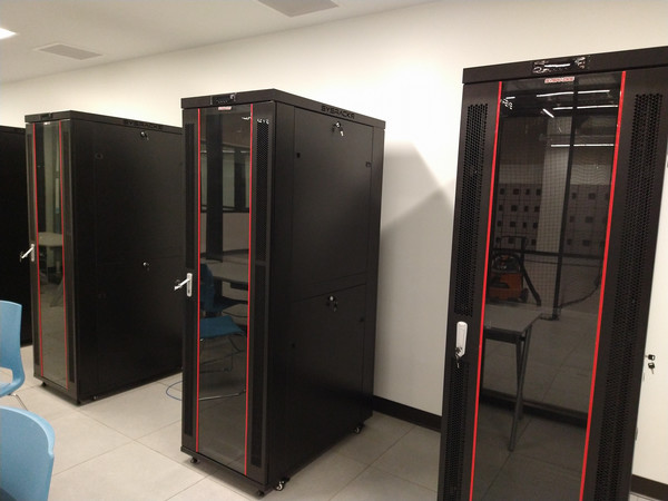 erver racks and computing equipment housed within the UAV Cyber Lab in Building 98.