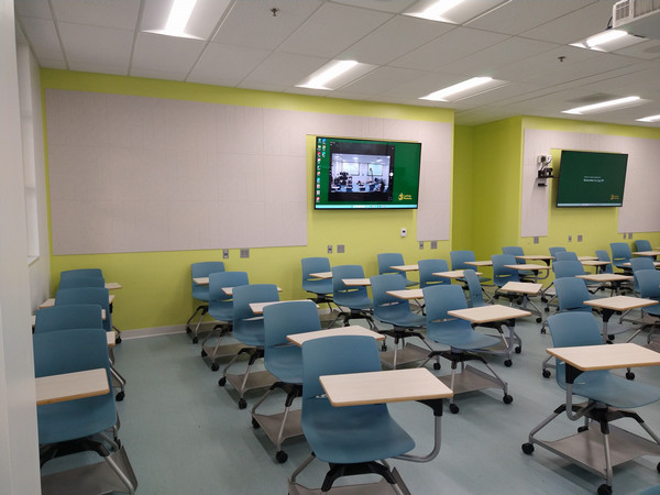 Modern classroom in the College of Engineering, Building 17-1631, with flexible seating and integrated digital displays.