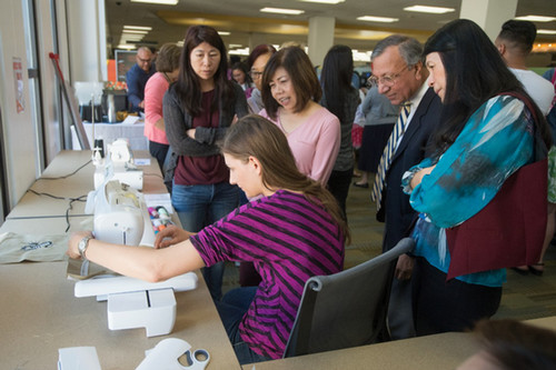 Demonstrating how the sewing machine area works