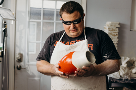 Kelvin Crosby working on pottery