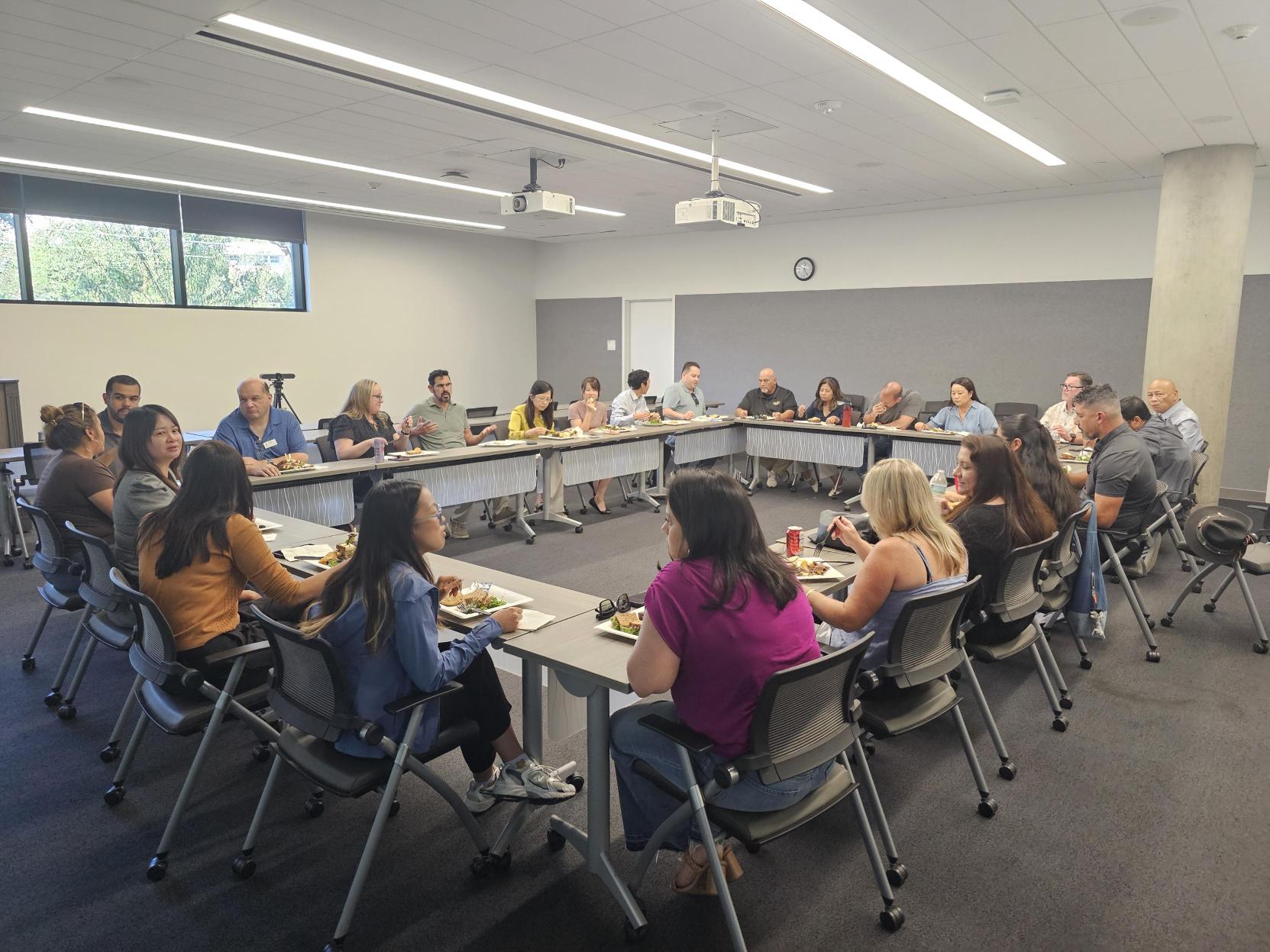Administrative Affairs staff who helped successfully implement P2P and Concur eating lunch.