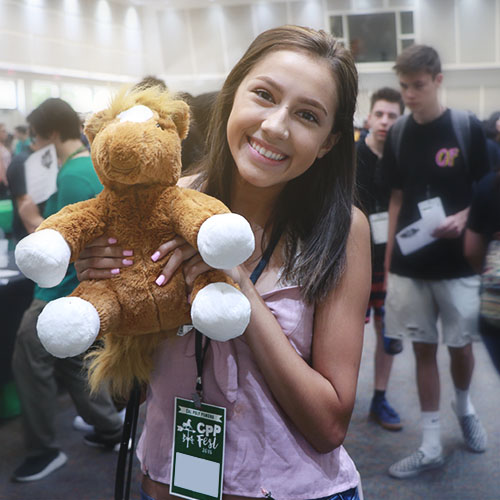 Students with stuffed animal 