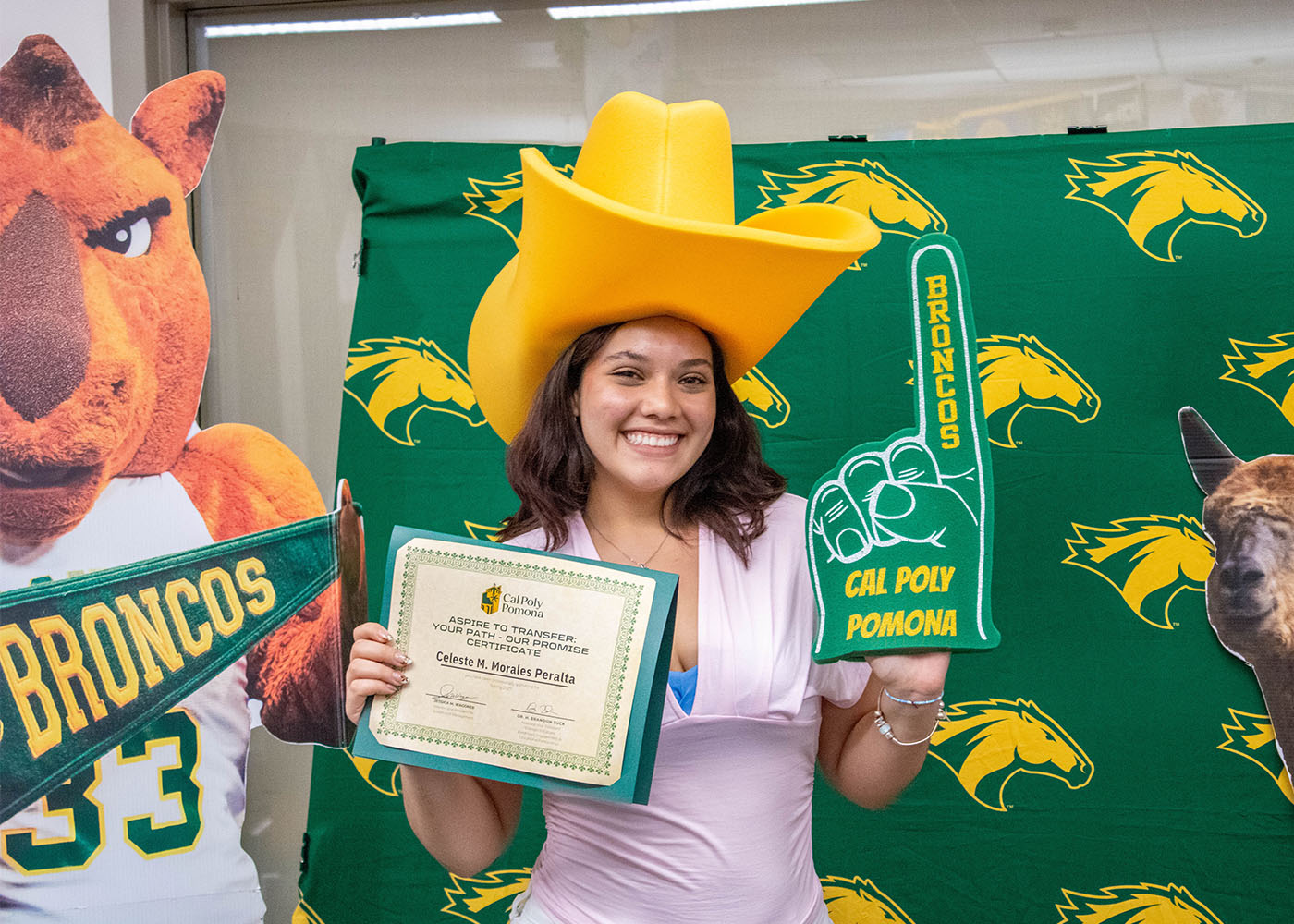 Student holding her admission certificate