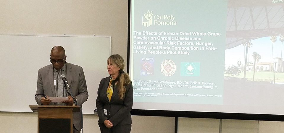 Professor Ondieki Gekara introduces Professor Bonny Burns-Whitmore at the ARI Showcase.