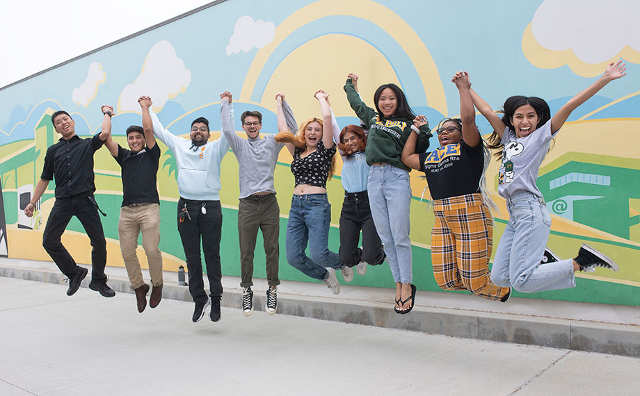 A group of students jumping in the air.