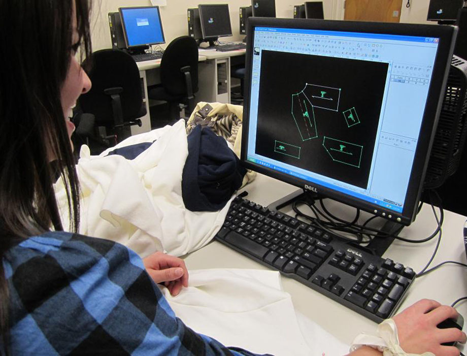 A student designs a garment on a computer