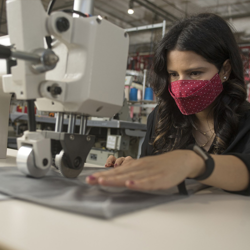 Student works on a sewing machine