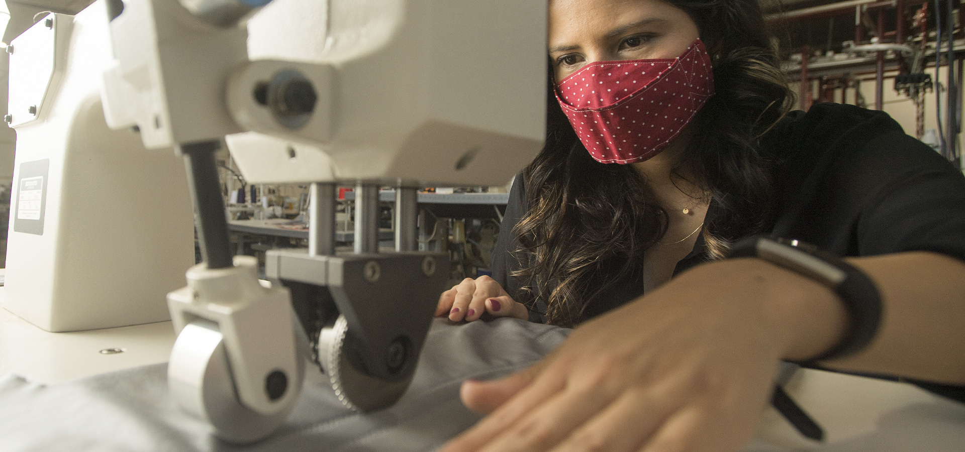 An AMM student uses a sonic bonding machine.