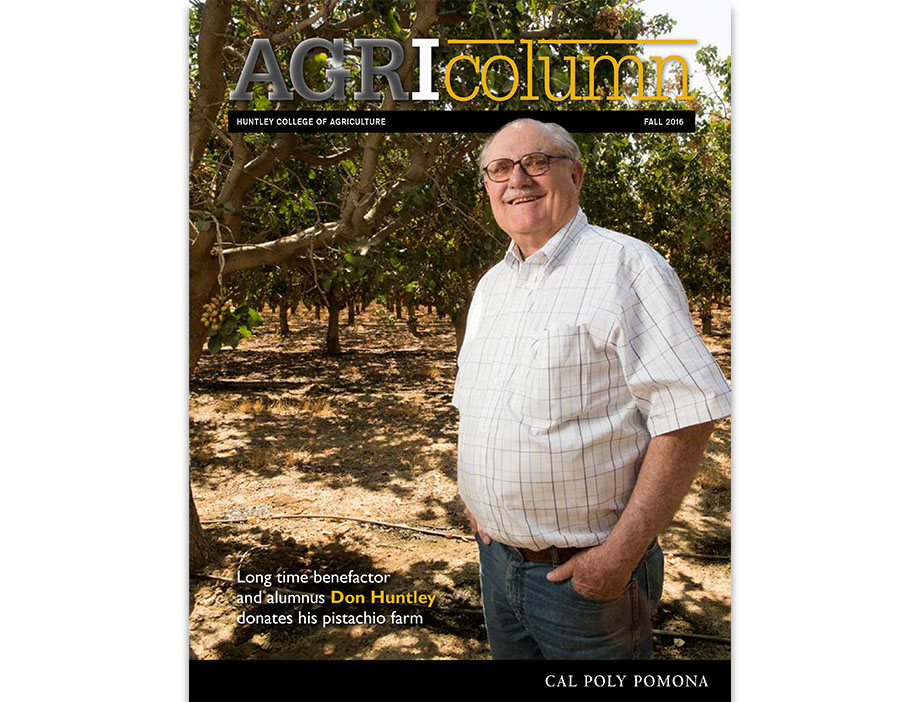 Don Huntley poses among the pistachio trees on his farm.