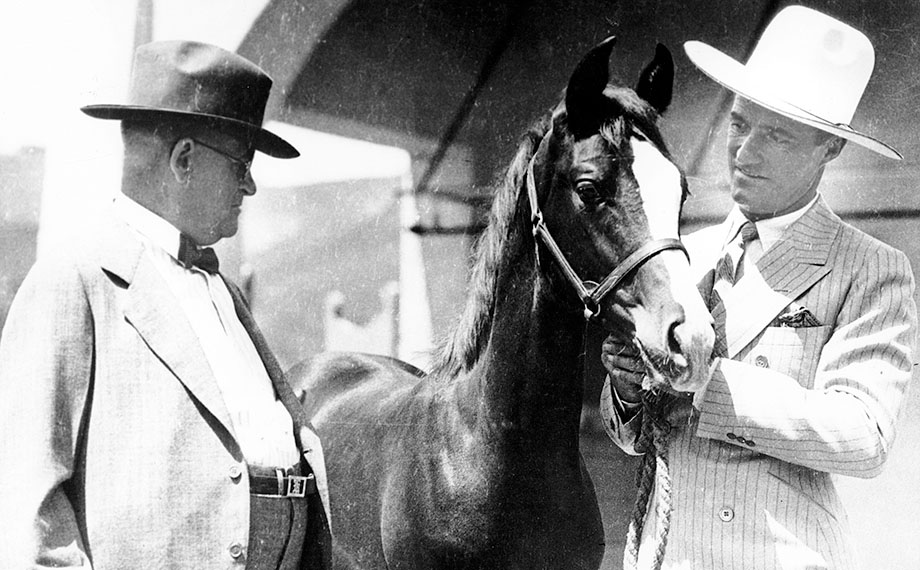 W.K. Kellogg and actor Tom Mix with an Arabian horse