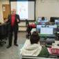 Henry Cherner, managing partner of AIMS360, talks to AMM students about his software.