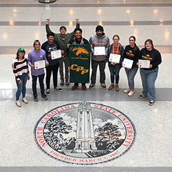 Cal Poly Pomona students posing at the competition on the North Carolina State campus