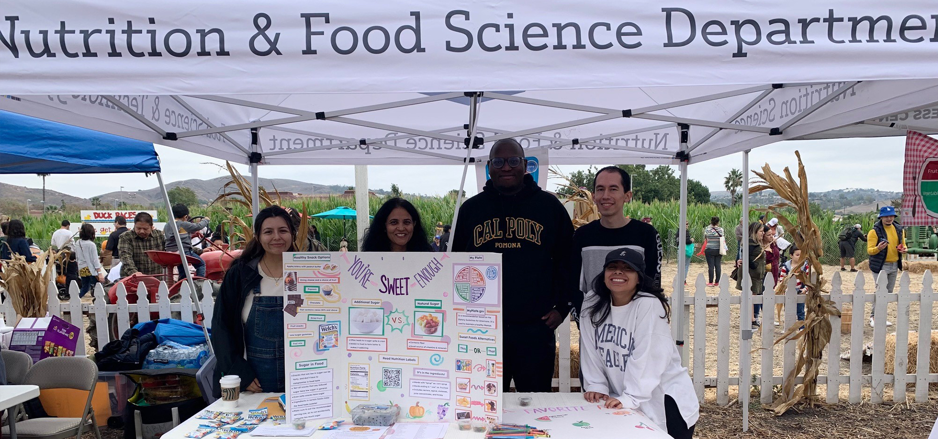 Nutrition students pose at their booth