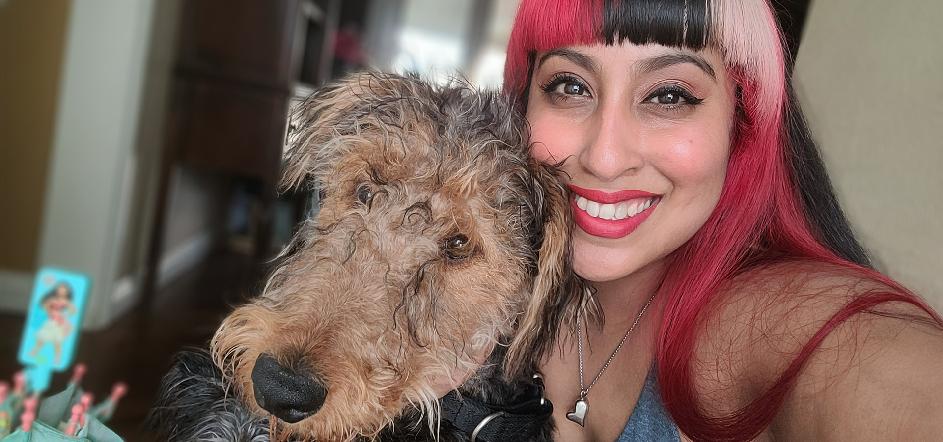 Elise Contreras poses with a dog