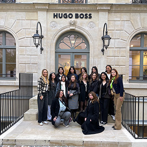 AMM students pose outside the Hugo Boss offices in Paris. 