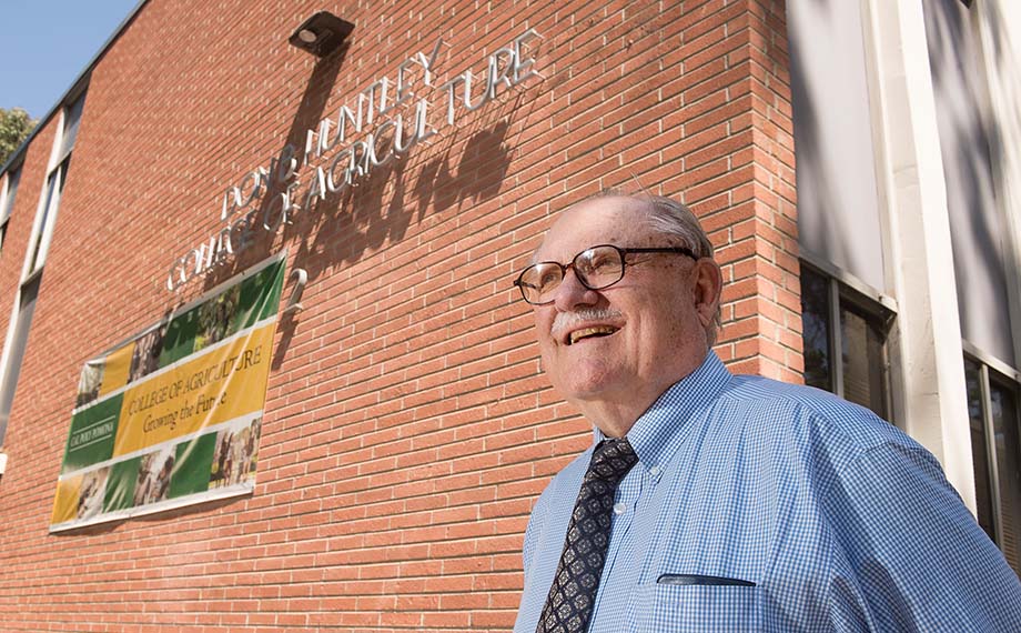 Don B. Huntley poses outside Building 2 on the Cal Poly Pomona campus.