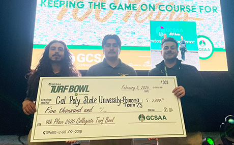 Magdaleno Basilio, Joel Torres, and Jaxx Curiel pose with their check. 