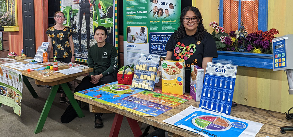Nutrition students man a booth at the LA County Fair.