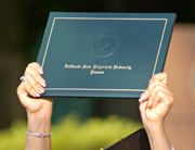 Student with diploma