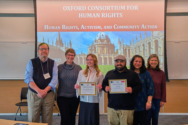 ahimsa student leaders in a group holding certificates