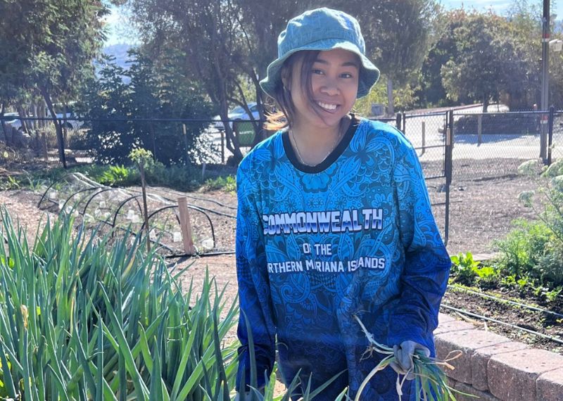 Student maintaining the plants.