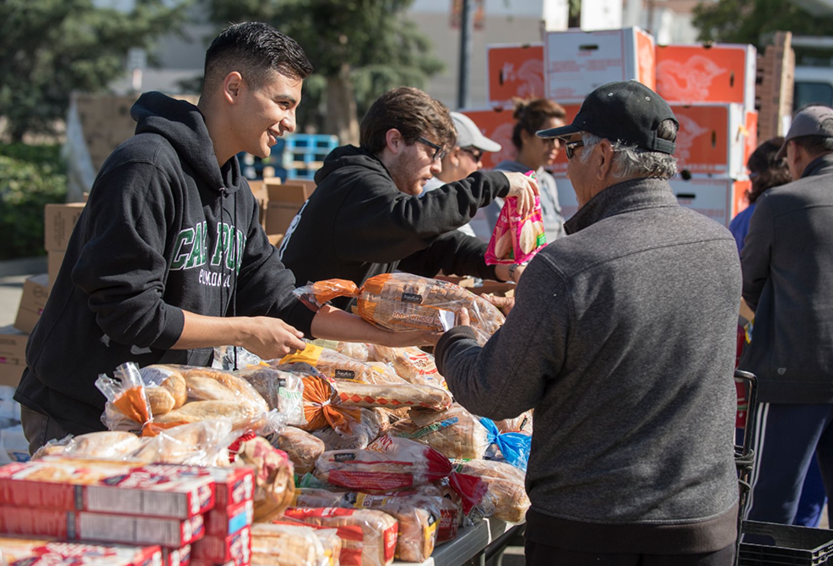 students participating in community food drive