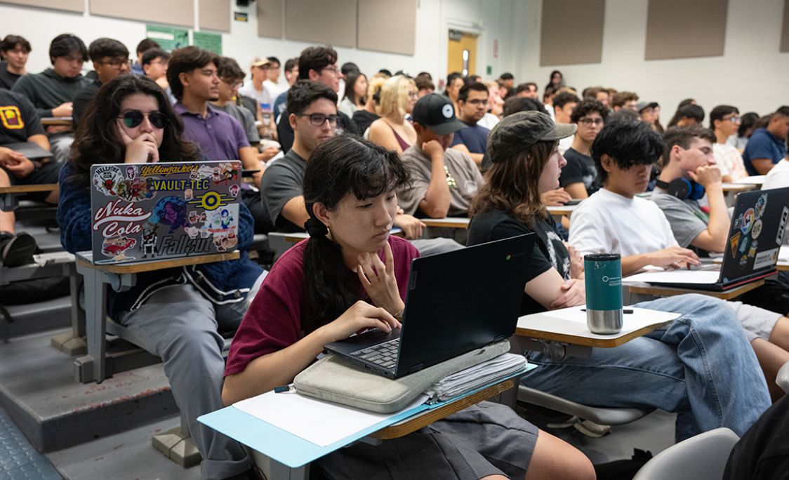 students in a lecture hall attending a class