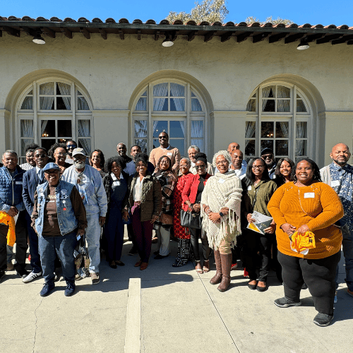 alumni at gathering event in kellogg house pomona