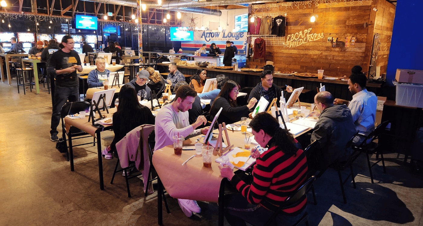 alumni painting at mixer event