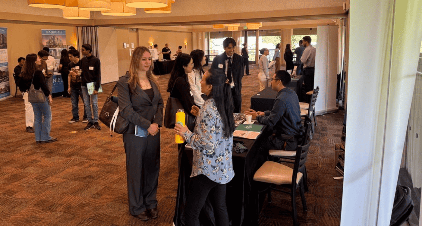 students speaking with employers at the urp career day event