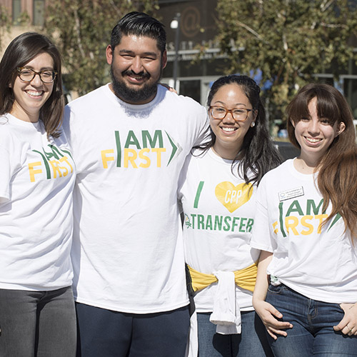 Students posing with I AM FIRST tshirts
