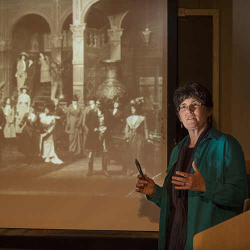 Professor for a Day photo of  alumna speaking in a history class.