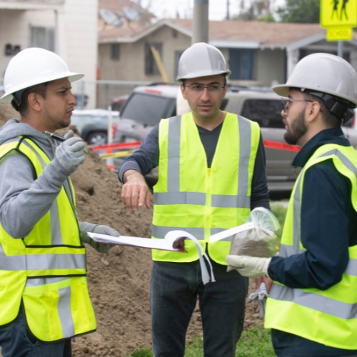 three engineering students talking