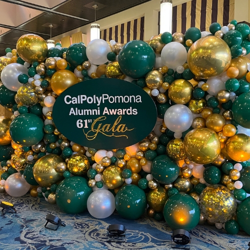 cal poly pomona distinguished alumni awards gala and yellow and gold balloons