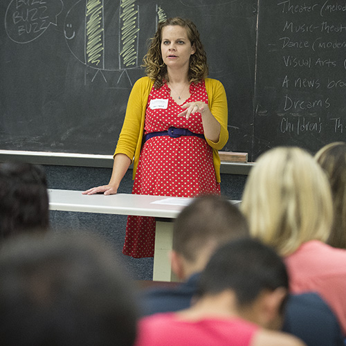 Professor for a Day alumna speaking in a College of Education class.