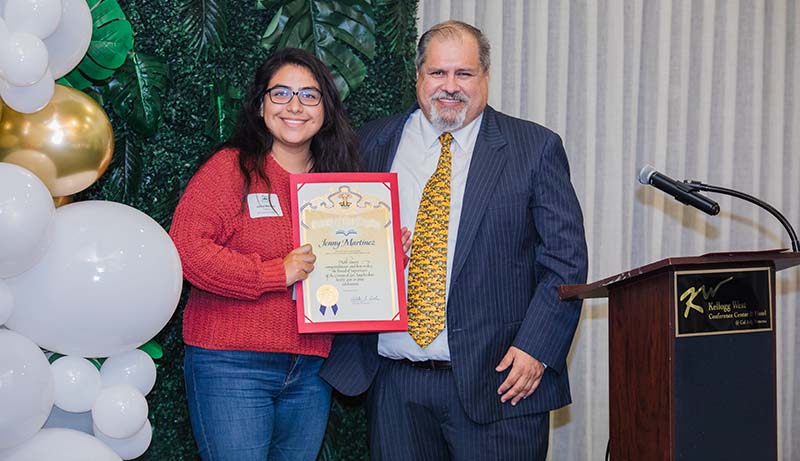 Hilda Solis Scholarship Recipient receiving award