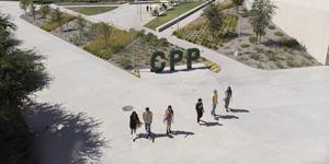 students walking by the CPP letters