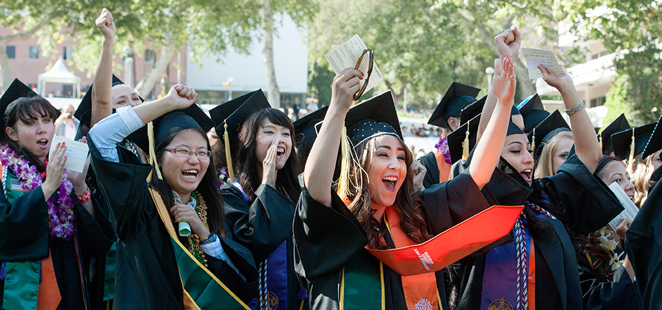 graduates celebrating