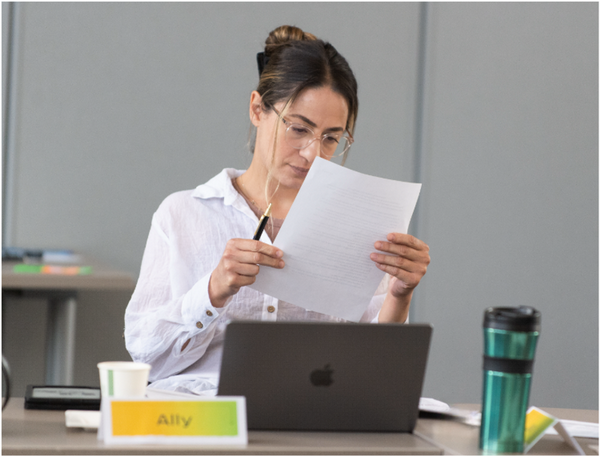 faculty working at assessment event