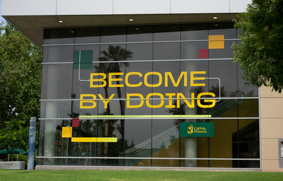 become by doing signage on university library 